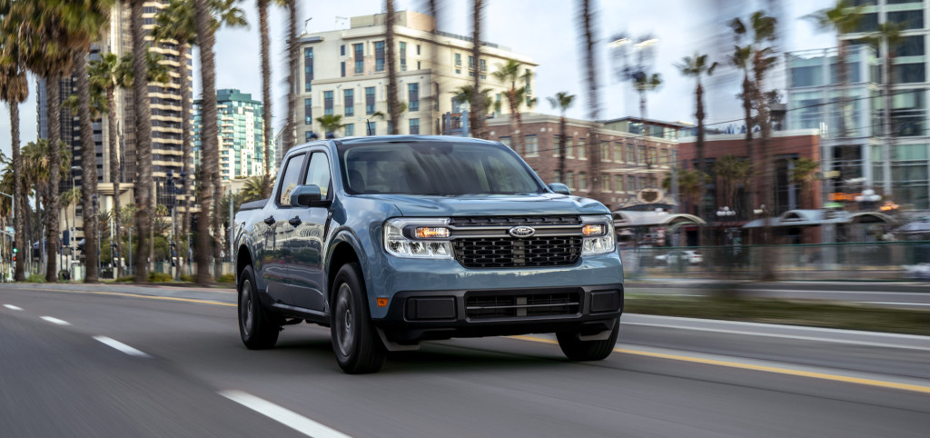 A blue 2023 Ford Maverick on the move