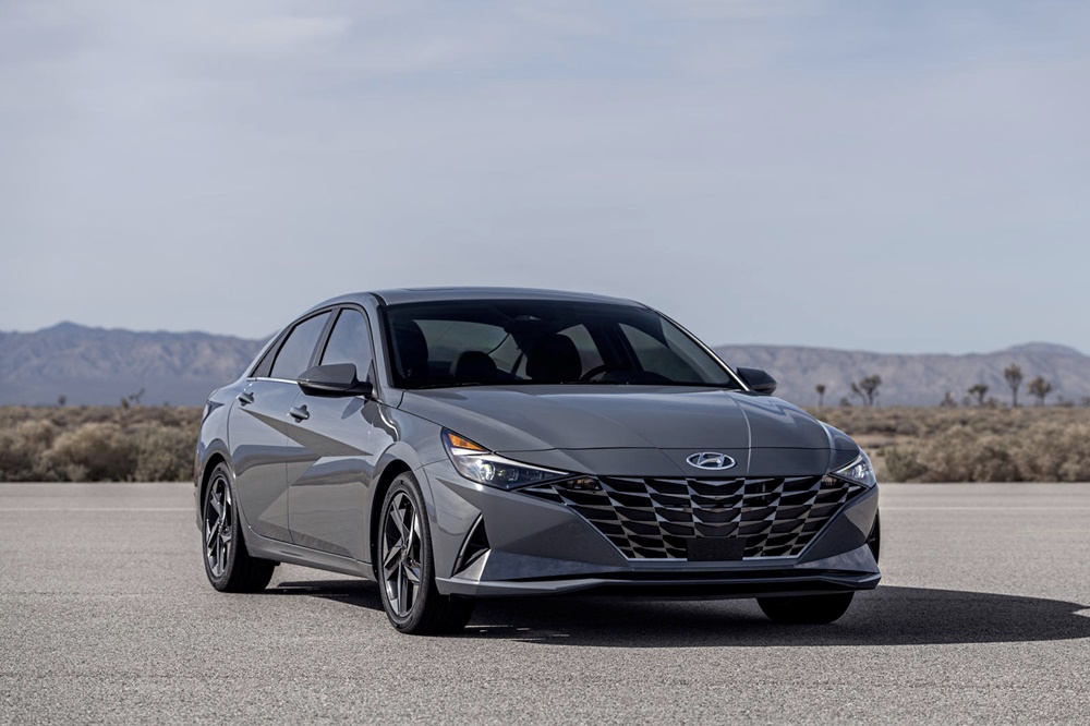 A parked metallic grey 2023 Hyundai Elantra Hybrid Blue