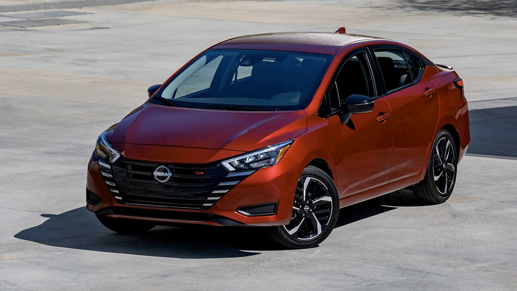 A parked red 2023 Nissan Versa