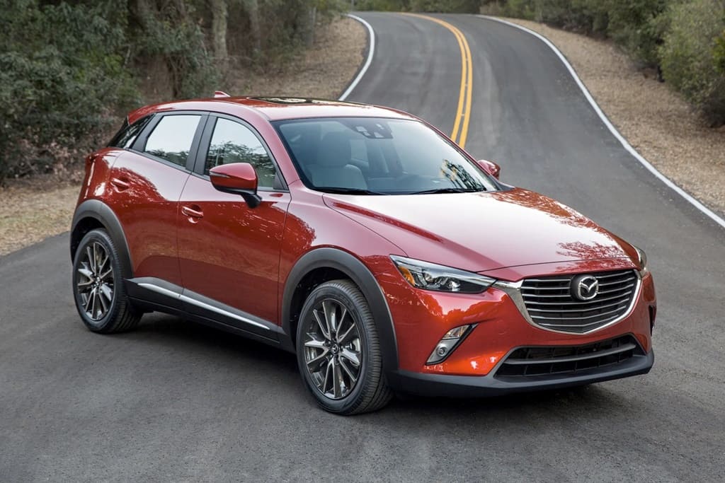 A parked red 2017 Mazda CX-3