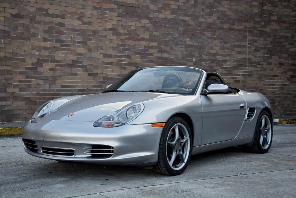 A parked silver 2004 Porsche Boxster S