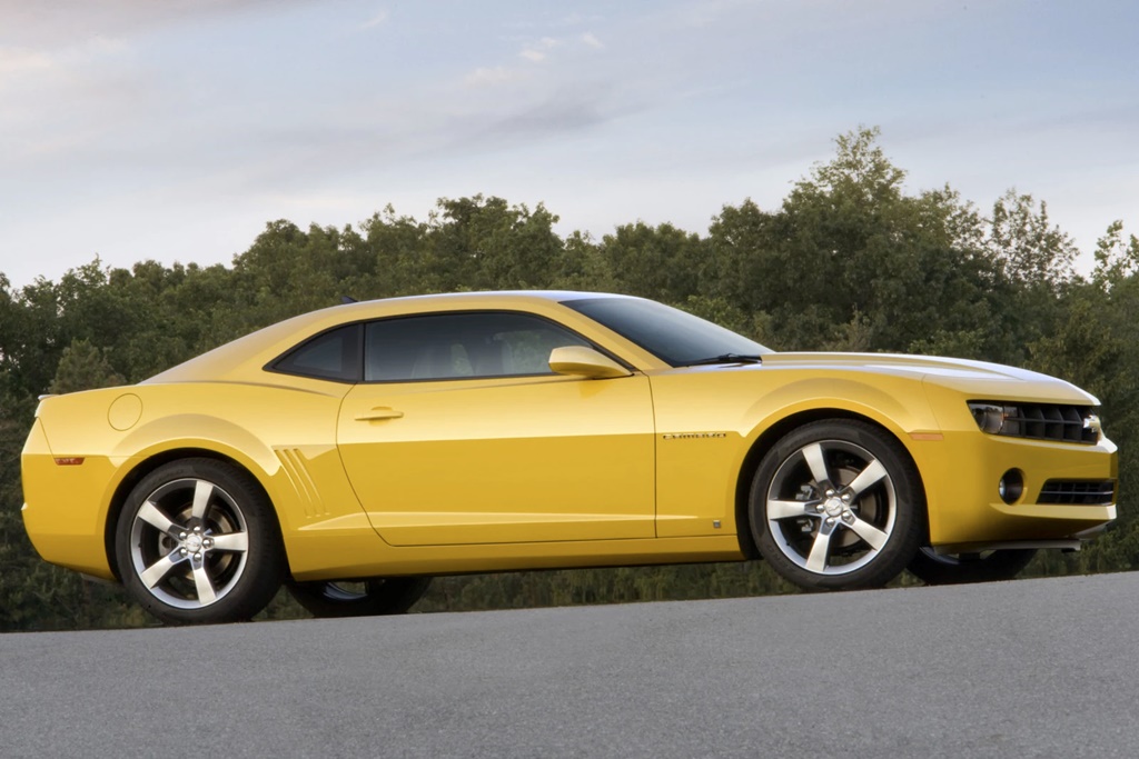 A parked yellow 2010 Chevrolet Camaro