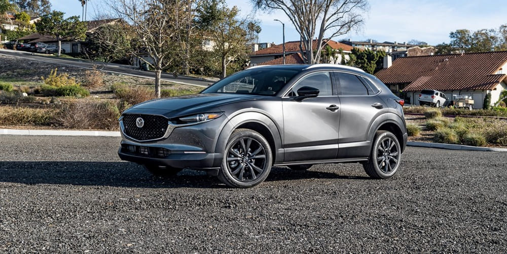 A parked silver 2023 Mazda CX-30