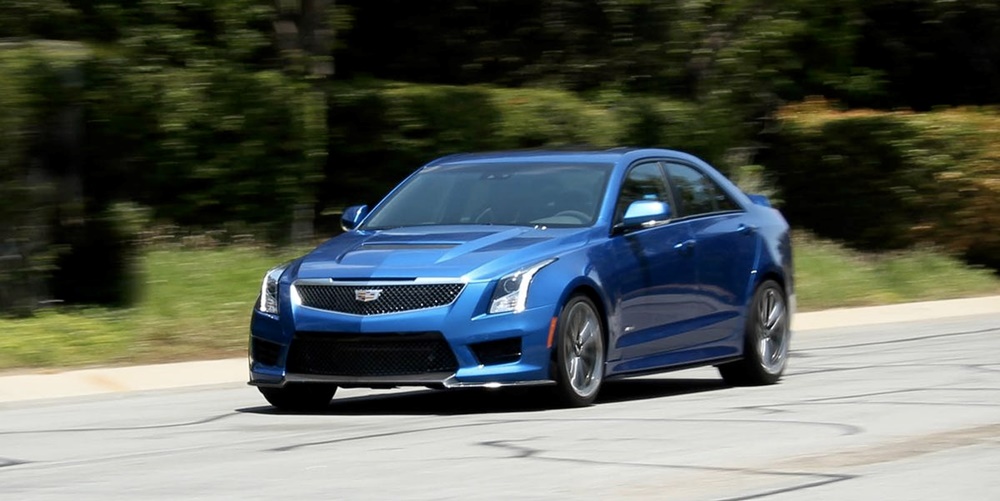 A blue 2016 Cadillac ATS-V on the road