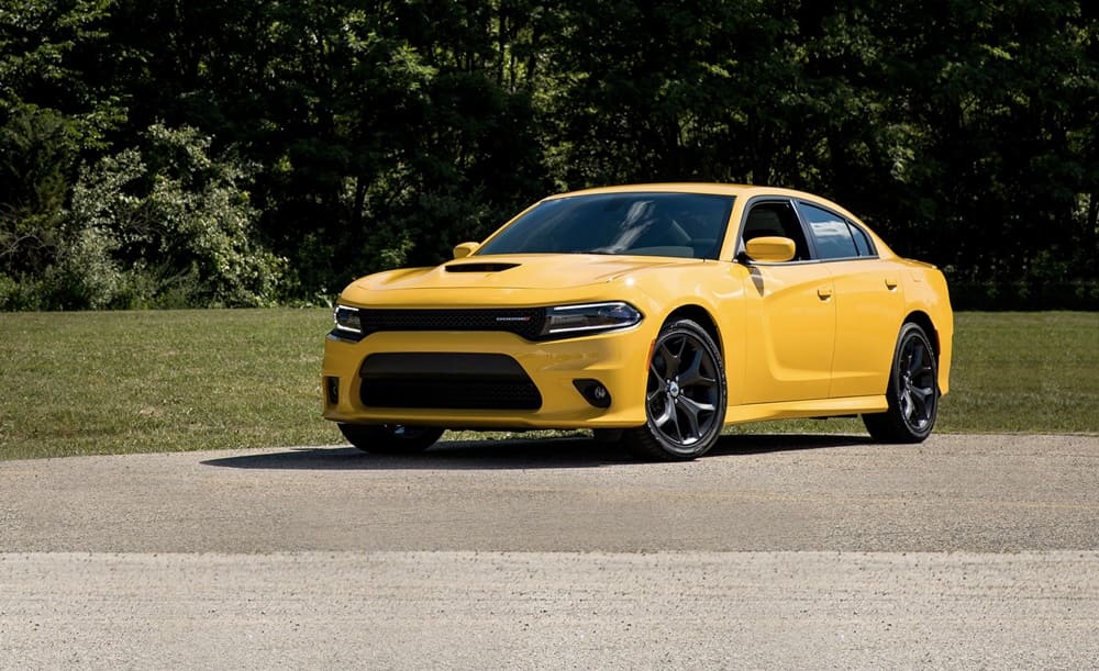 A parked yellow 2018 Dodge Charger