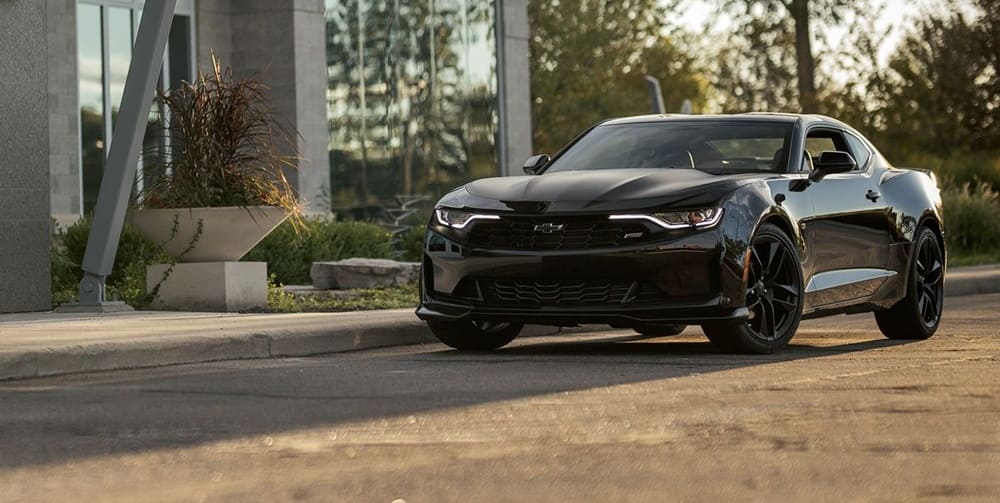 A parked black 2019 Chevrolet Camaro LT