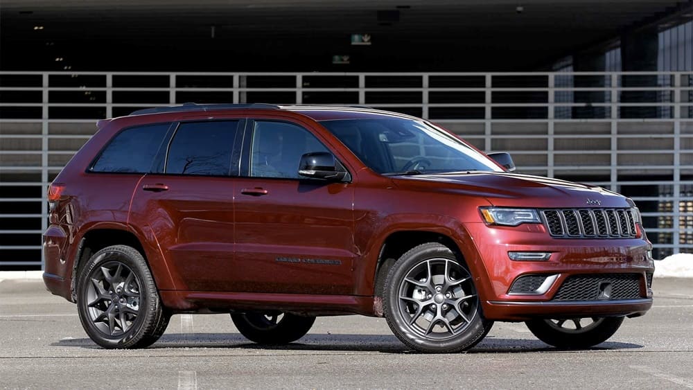 A parked red 2019 Jeep Grand Cherokee Limited