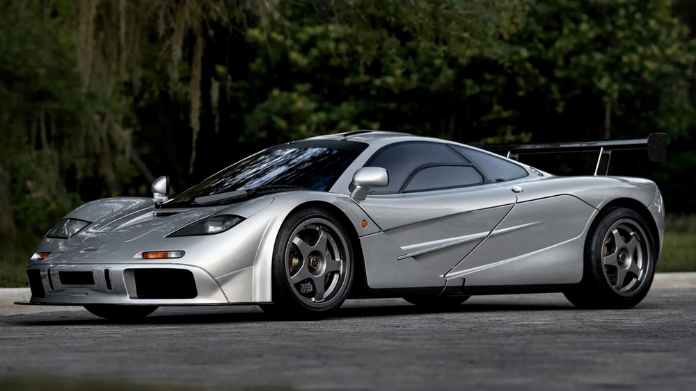 A parked silver 1994 McLaren F1