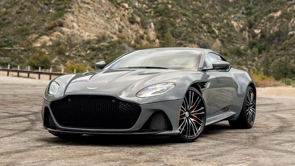 A parked silver 2023 Aston Martin DBS