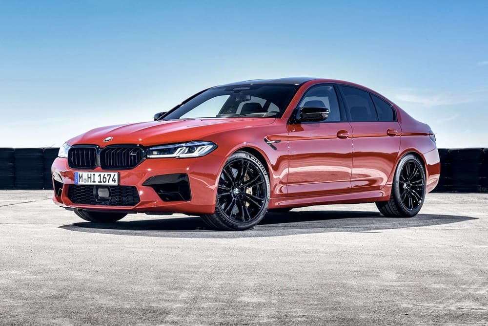 A parked red 2023 BMW M5