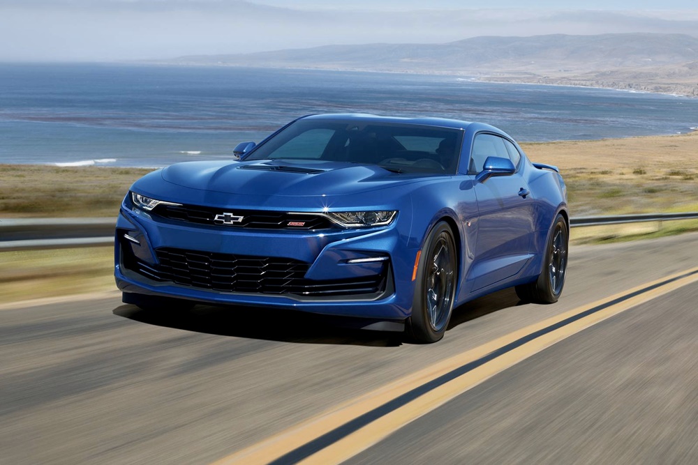 A blue 2023 Chevrolet Camaro LT1 on the road