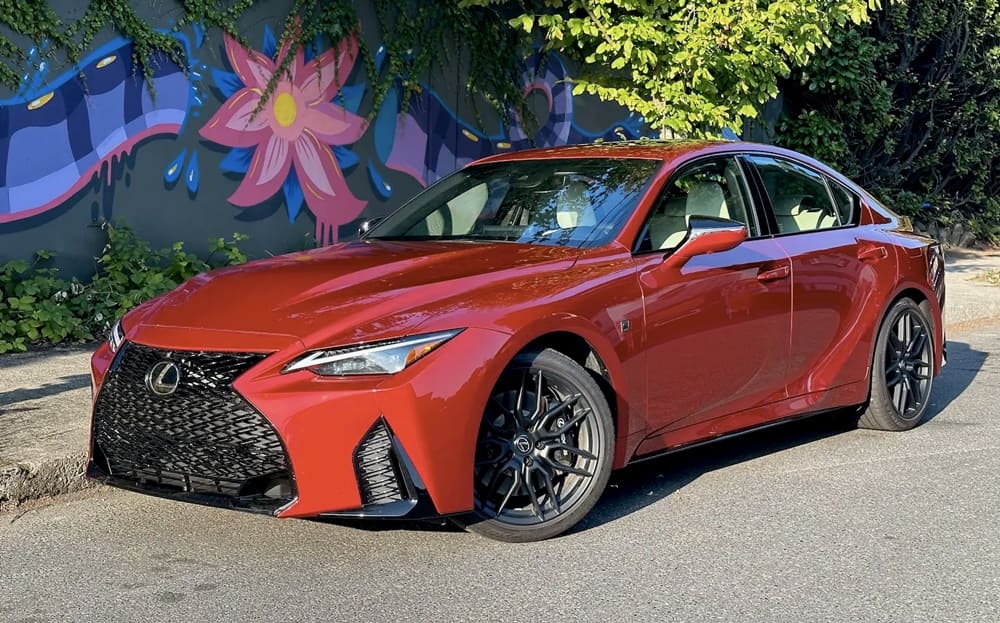 A parked orange 2023 Lexus IS500 F Sport Performance