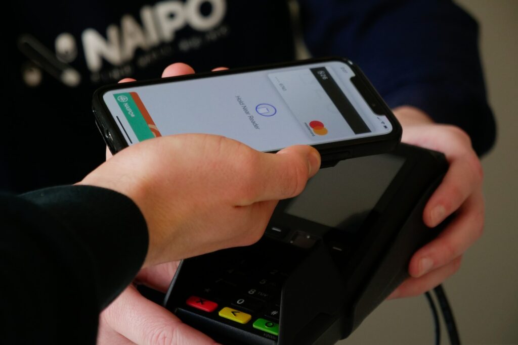 A man makes a payment via e-card