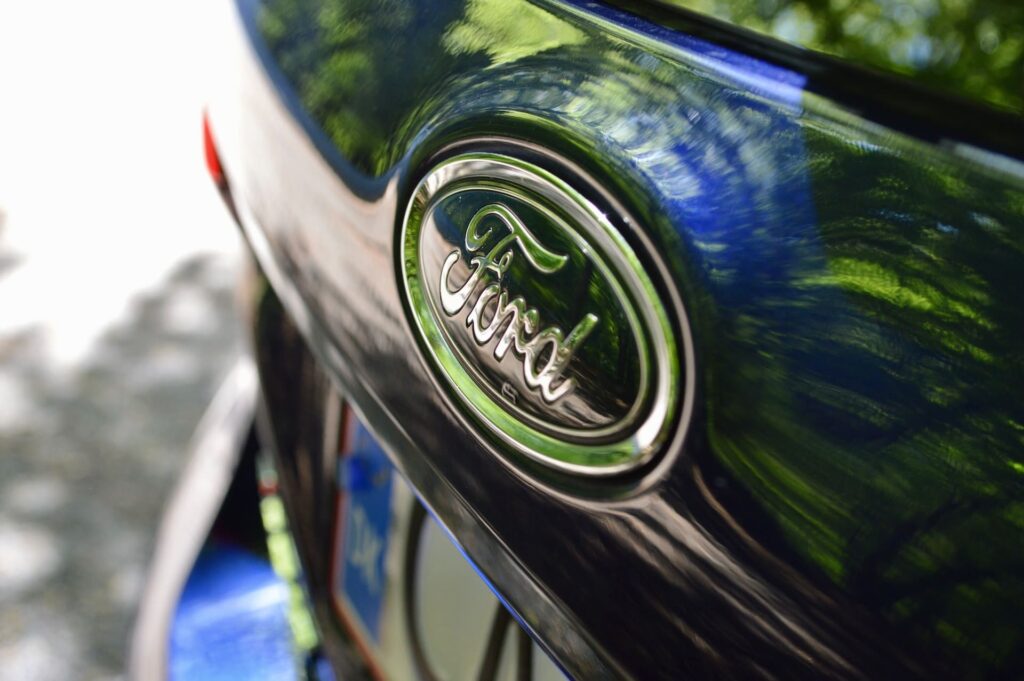 A close-up of the Ford logo on one of its car models